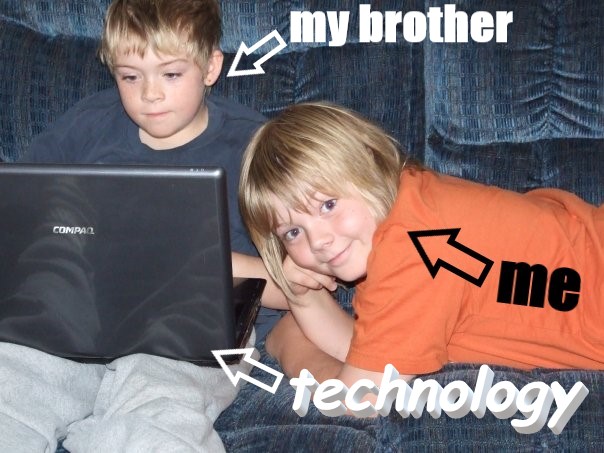 A picture of me as a kid beside a laptop
